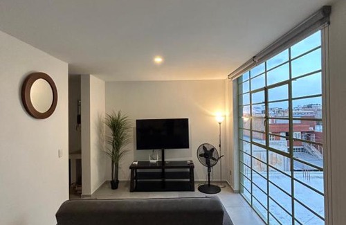 Downtown Guadalajara Apartamento | En el centro de Guadalajara con vista a la ciudad