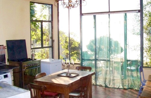 Villa Talla Apartamento | Encantador apartamento con vistas al mar y jardín, wifi.