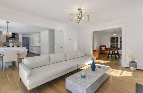 Southold Casa | Enchanting home with large backyard, stunning pool, expansive patio, and...