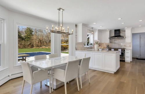 Southold Casa | Enchanting home with large backyard, stunning pool, expansive patio, and...