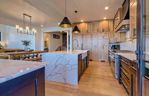 Elf Casa | Endless Sunsets By Chatuge Home Concierge private boat dock with covered boat slip and sun deck, bar, fire pit, pool table, kayaks