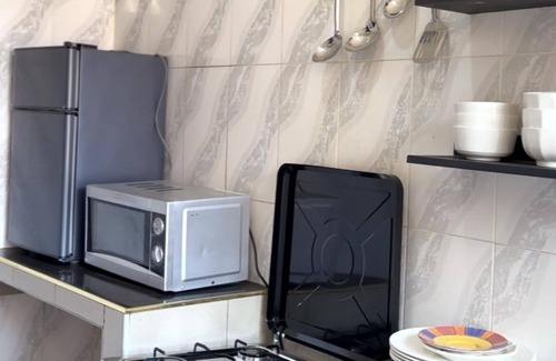 Iringa Apartamento | Enjoy a cozy stay in our spacious home featuring three comfortable bedrooms