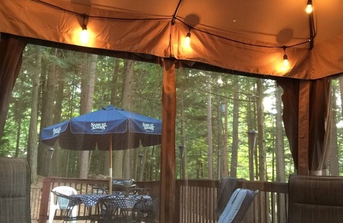 Northwood Cabaña | Enjoy being serenaded by loons at this rustic Northwood lake view cottage!