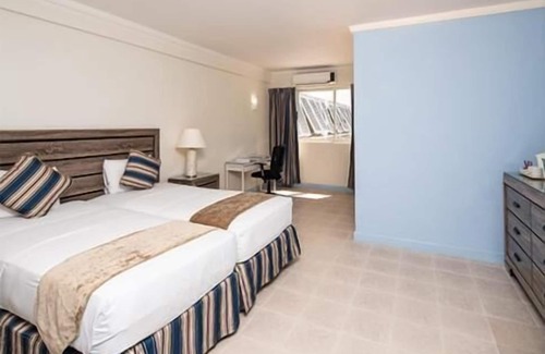 St. Lawrence Gap Hotel | Enjoy Great Games and Events at Garrison Savannah! FREE Parking, Outdoor Pool!