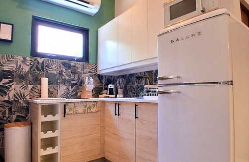 Hipodromo Condominio | Enjoy peace of mind in this beautiful 3-bedroom, 1-bath apt in the heart of San Juan. Casa Veda is equipped with a powerful generator and water cistern, guaranteeing you’ll never experience a blackout or be without water during your stay. Sleeps 6.