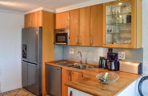 Dalaro Casa | Enjoy relaxing baths in the jacuzzi with sea view in this vacation home.