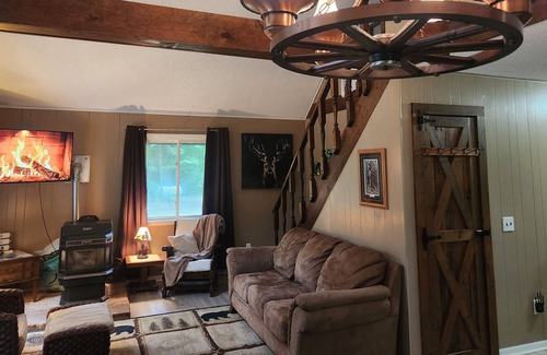 Kalkaska Cabina | Enjoy this cozy cabin nestled on 20 peaceful acres in Kalkaska Michigan.