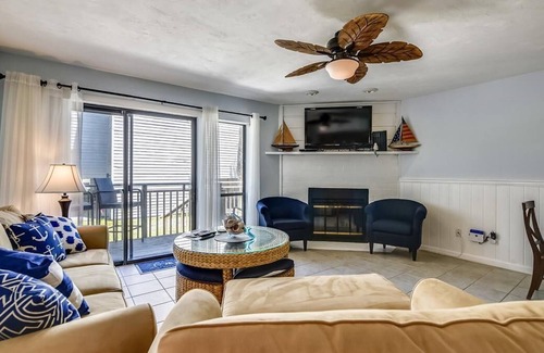 East End Casa | Enjoy this updated townhome with views of the gulf and pool from the deck.