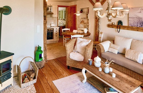 Fehmarnsund Apartamento | Enjoy your vacation: Sea view, terrace & fireplace -BEACHHOUSE FEHMARN apartment Ostwind