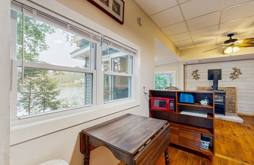 Augusta Cabina | Entire lakefront home on Togus Pond with decks, canoe, firepit & great view