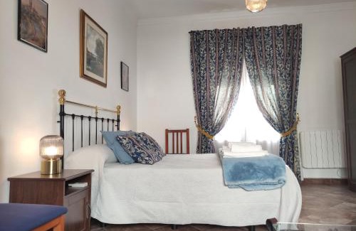 Carmona Apartamento | Entretorres. Casa-dúplex en centro histórico.