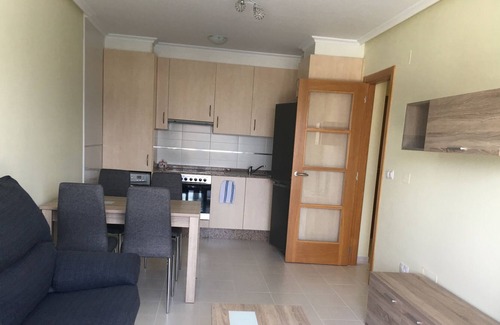 Porto de Espasante Apartamento | Apartamento en urbanizacion con piscina, balcón y vistas al mar y al campo