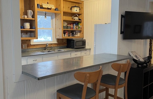 Newaygo Cabaña | La fuga de Logan Cottage en Muskegon río