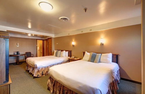 Harbor Hotel | Escape to a Classic Stateroom on an Iconic Ocean Liner with Dining | 3 Rooms