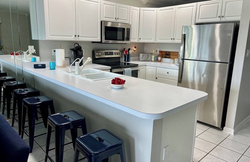 Heron Harbour Isle Condominio | Escape to Elegance: Heron Harbor Condo, Your Bayside Retreat