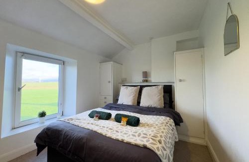 Calder Bridge Casa | Escape to our Cosy Cottage with Log Burner in Drigg, Lake District