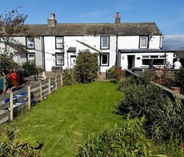 Calder Bridge Casa | Escape to our Cosy Cottage with Log Burner in Drigg, Lake District