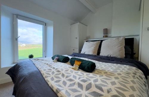 Calder Bridge Casa | Escape to our Cosy Cottage with Log Burner in Drigg, Lake District