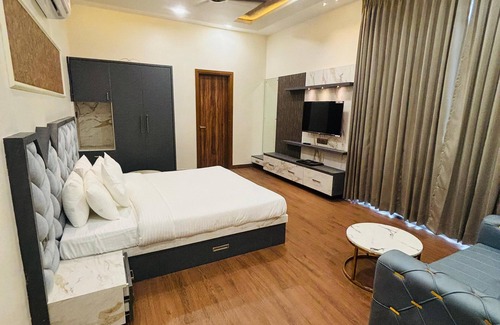 Jaipur District Otro | Escape to the Rhythm of Serenity at Symphony Farms Jaipur.