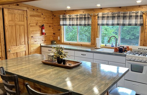 Winamac Cabina | Escape to The Riverside Hideaway - A Cozy Cabin With River Views!