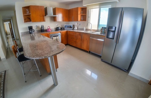 Zona Hotelera Norte Condominio | Nuevo en el mercado condominio frente al mar en Peninsula Grand Cozumel!