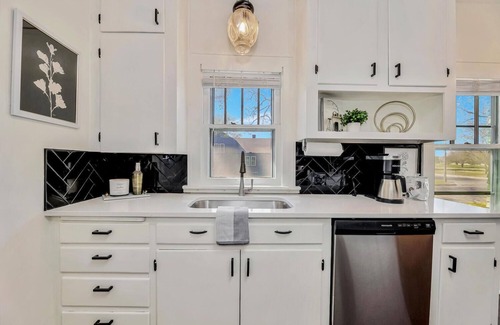 Wichita Casa | Esmeralda on the Green, golf course views from darling porch with daybed swing!