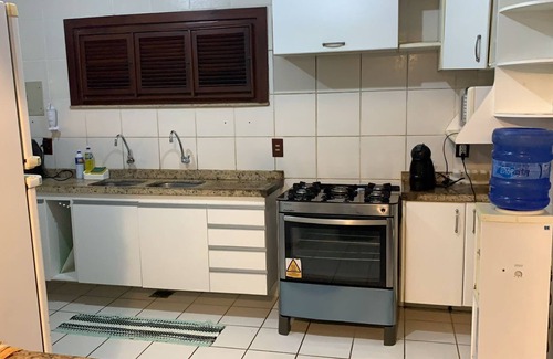 Loteamento Parque das Fontes Casa | Gran casa en la playa con vistas al mar, piscina con cascada y terraza