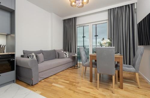 Wola Apartamento | Exceptional Business Apartments by Noclegi Renters