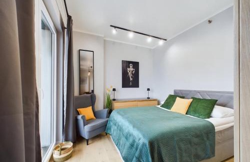 Wola Apartamento | Exceptional Business Apartments by Noclegi Renters