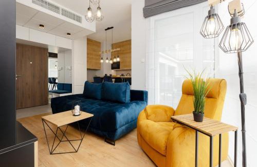 Wola Apartamento | Exceptional Business Apartments by Noclegi Renters