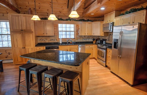 St Germain Cabina | Exceptional log home on 9+ acres with frontage on Big St. Germain Lake