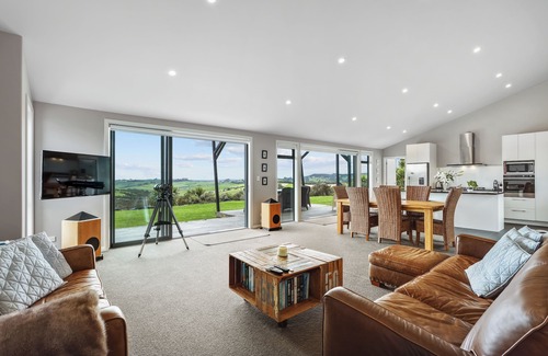Mangawhai Casa | Exclusive home with uninterrupted views of the Hen & Chicks, set in Native Bush
