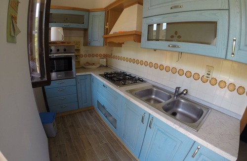 Alghero Apartamento | Exclusivo ático con vistas al mar ....... con playa desierta debajo de la casa.