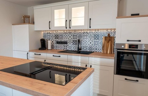 Brimingen Casa | Exclusive suite with whirlpool, sauna 1-2 persons - Ferienhaus Im Lachergarten