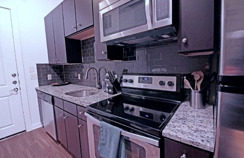 Barton Heights Condominio | Pasos del condominio ejecutivo del centro
