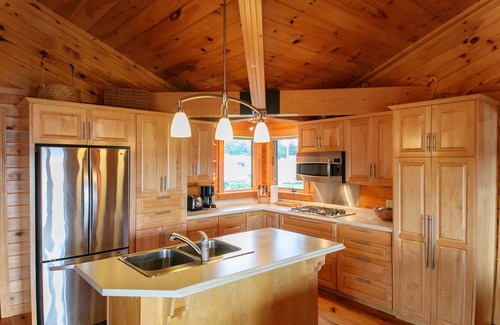 Bay Fortune Cabaña | Ejecutivo casa familiar de estilo en el agua