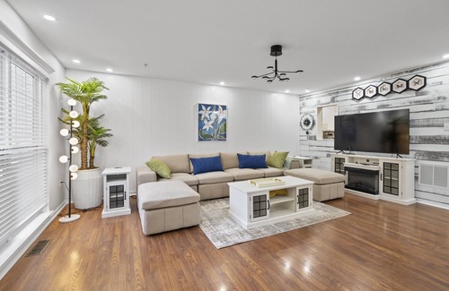 Owings Mills Casa | Experience Elevated Comfort: Luxe Breeze Townhouse.