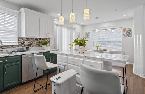 Owings Mills Casa | Experience Elevated Comfort: Luxe Breeze Townhouse.