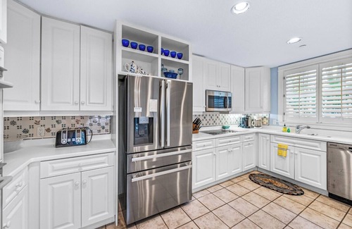 Boca Grande Casa | Experience luxury at B-505 Buttonwood, a spacious 4-bedroom, 3-bathroom home in Boca Bay