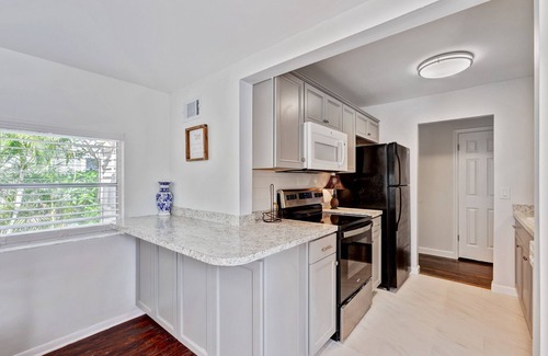 Parker Ridge Casa | Experience Serene Living: Charming 3/1 Home Walk to New Public Golf Course WPB!"
