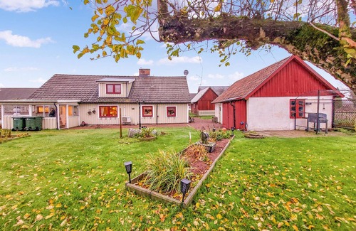 Broby Casa | Experience the beautiful Helgeå River during a vacation in this vacation home.