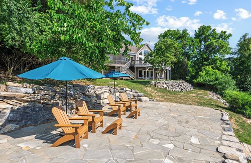 Pulaski Casa | Experience the perfect blend of rustic charm and modern luxury in this Claytor lakefront retreat
