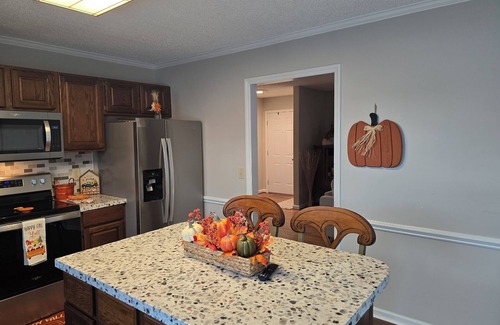 McLeansville Casa | Experience the warmth of a charming home that offers a serene view.