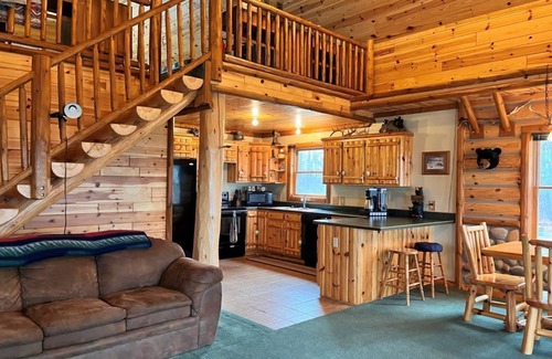 Vienna Township Casa | Explore Michigan's Elk Country At This Cabin Retreat-Outdoor Enthusiast Dream