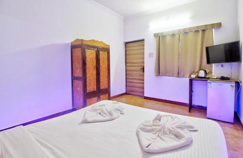 Morjim Hotel | FabHotel Pleasure Inn