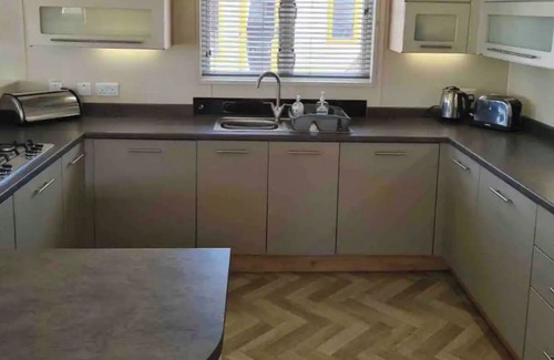 Dogdyke Cabina | Fable Lodge - Luxury lakeside lodge with sunken hot tub at Tattershall Lakes