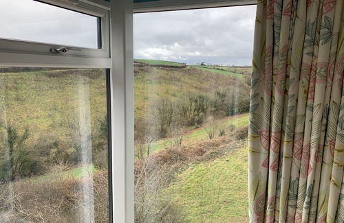 Saltash Casa | Fabulous barn, tennis court,wood fired hot tub tucked away on working farm