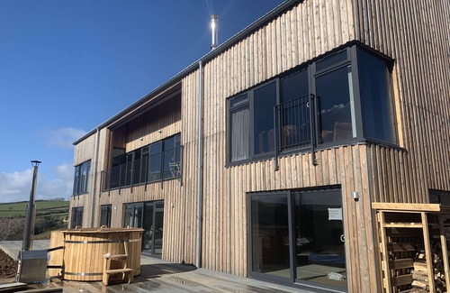 Saltash Casa | Fabulous barn, tennis court,wood fired hot tub tucked away on working farm