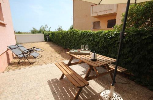 Portiragnes-Plage Apartamento | Face à la mer, Joli Studio de plain pied climatisé, exposé plein sud, pour 2 à 4 couchages, à seulement 10m de la plage LXBFM34
