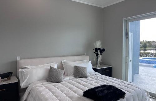 Palm River Estates Casa | Fall in Naples - Game Room pvt pool hot tub impeccable decor